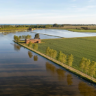 Tour in barca a Carole con catamarano elettrico Sun Kiss - Navigazione fluviale lungo il Brian con visita azienda agricola La Fagiana